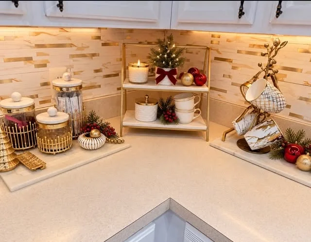 Cozy kitchen corner shelves with a mini Christmas tree and candles