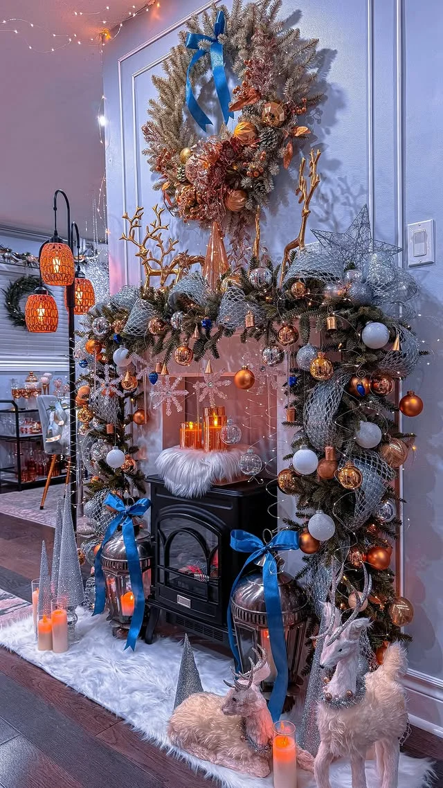 Dramatic asymmetric mantel with blue ribbons and copper ornaments