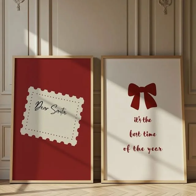 Two framed typography art prints in red and cream Christmas colors