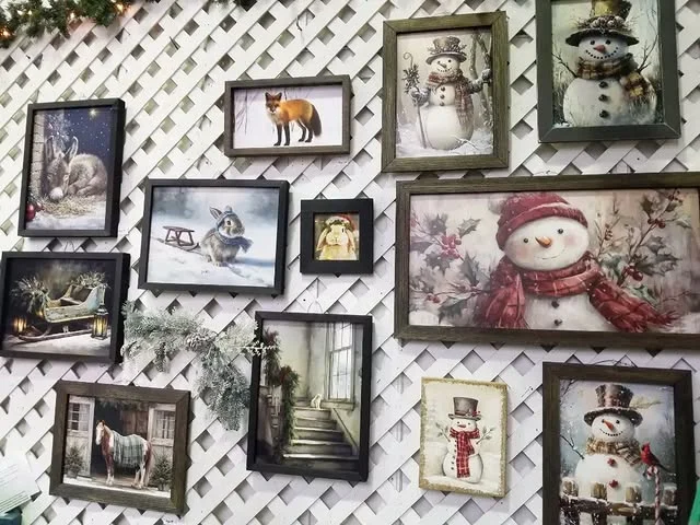 Gallery wall of framed vintage Christmas artwork