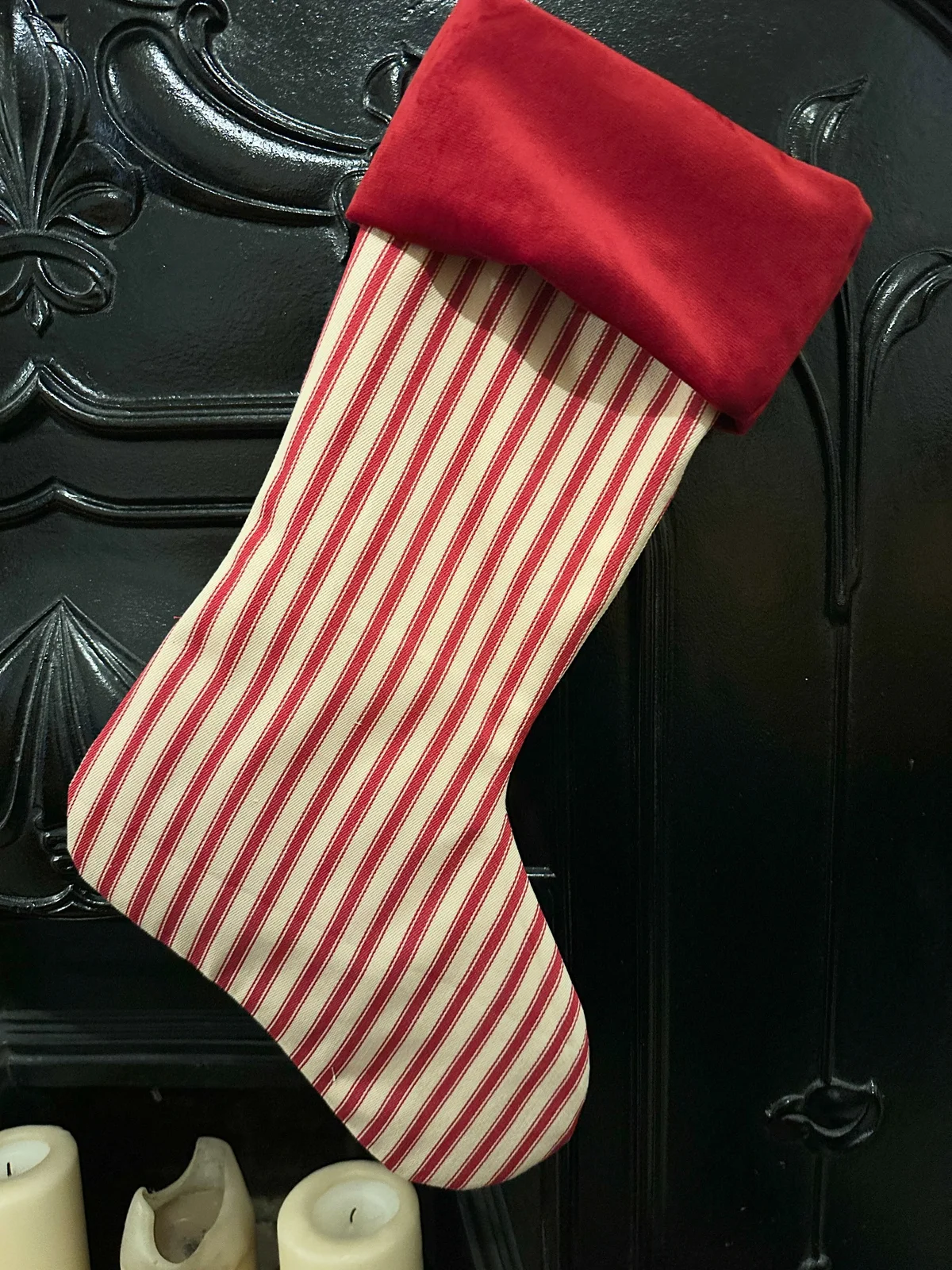 Red and cream ticking stripe Christmas stocking with a red cuff