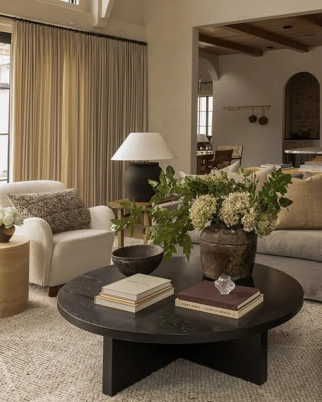 Neutral living room with layered linen, boucle, and jute textures