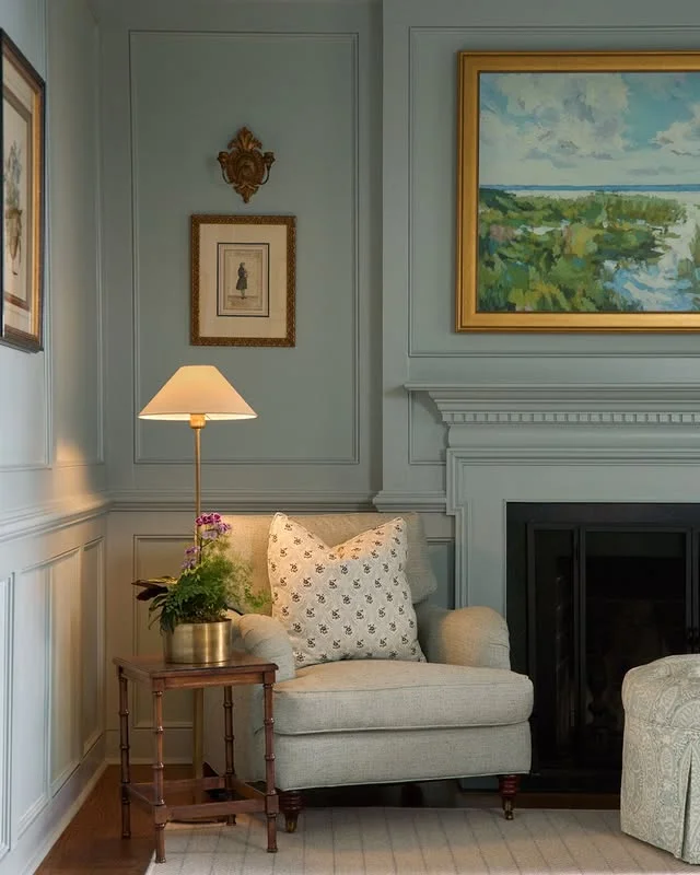 Living room glowing with warm layered lamp lighting