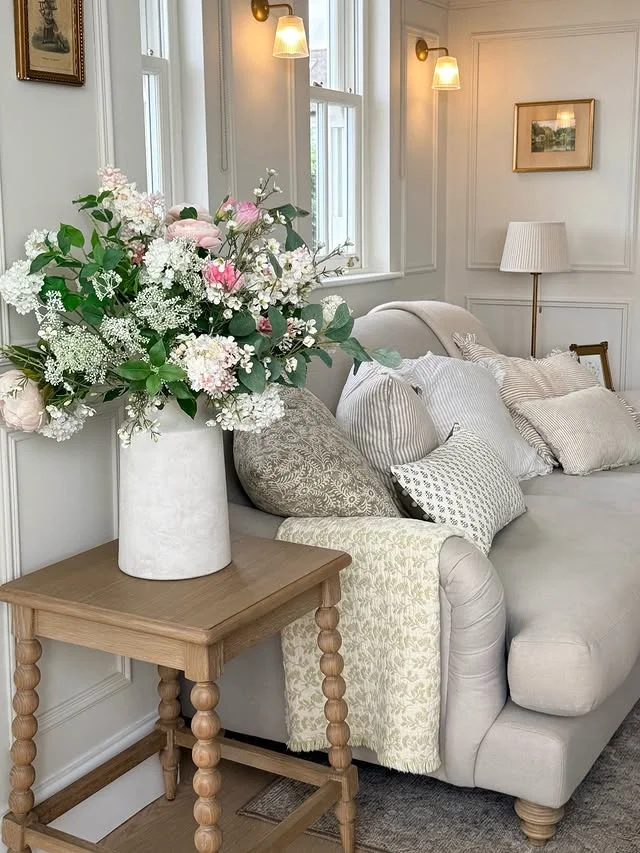 Styled side table next to a sofa